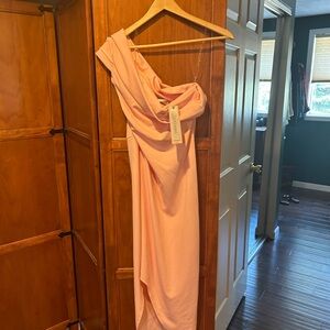 Beautiful one shoulder dress! NWT. Peach/ pink color